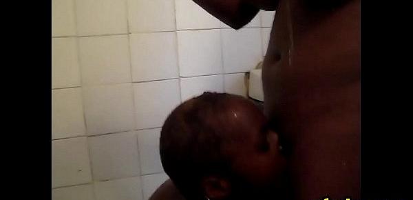  Bald lesbian african woman gives head in shower